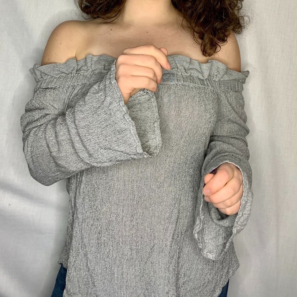 Off-the-shoulder flowy gray ruffled shirt